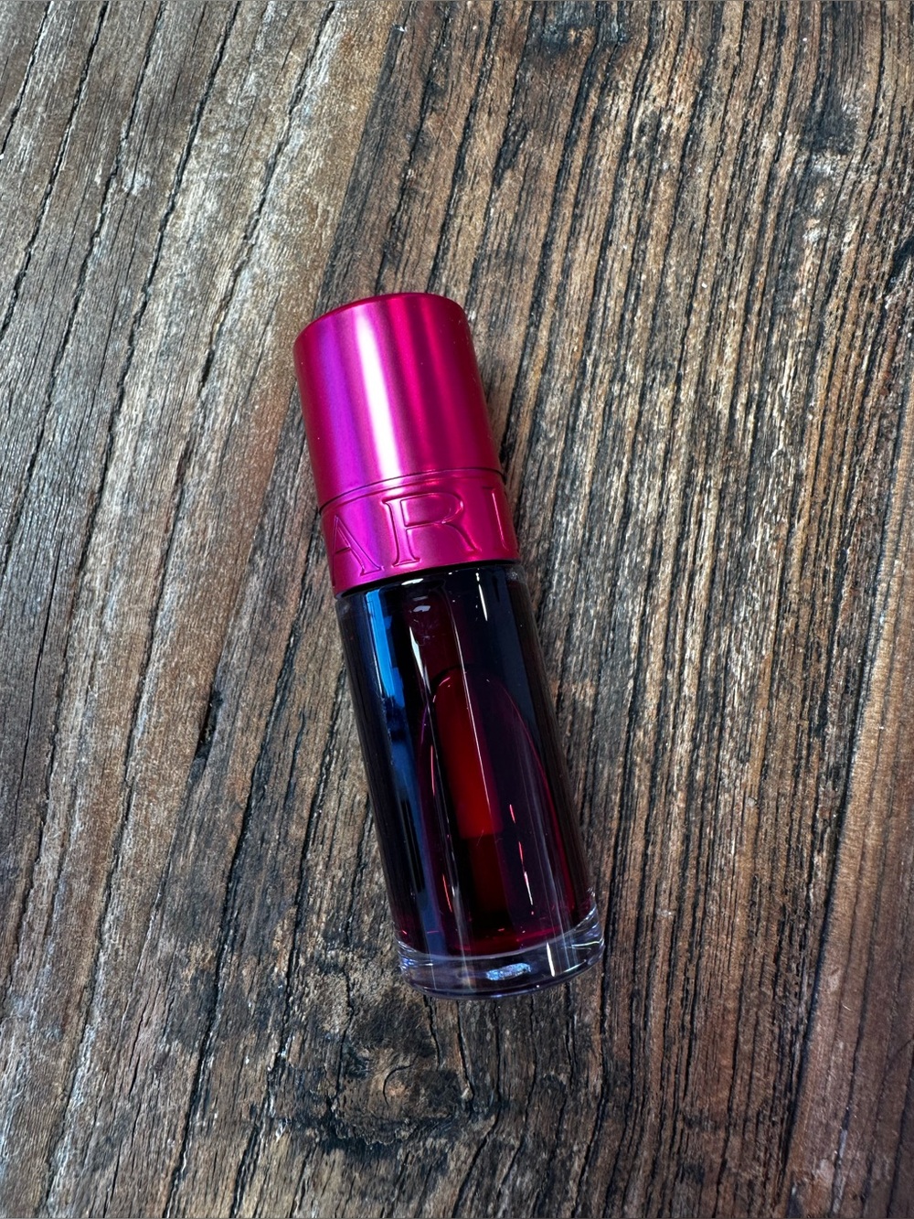 Clarins Pink-Metal Cap Liquid Lipsrain with Deep Red Shade